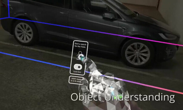 Gjennom Hololens-brillene får man opp en virtuell hånd og en meny for å interagere med Teslaen. 📸: LinkedIn