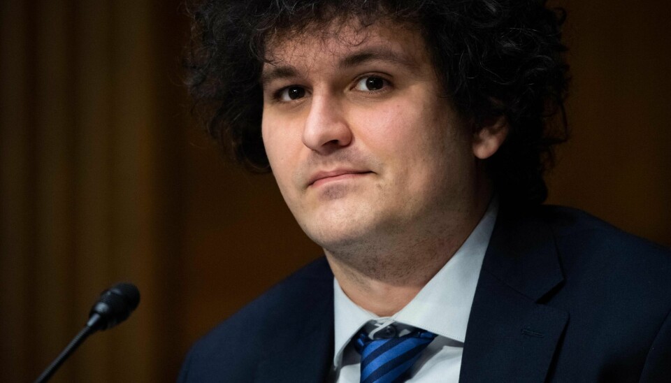 Sam Bankman-Fried har vært under etterforskning av justisdepartementet i USA og myndighetene på Bahamas etter at selskapet hans, som var verdsatt til 32 milliarder dollar, begjærte seg konkurs 11. november. 📸: SAUL LOEB / AFP